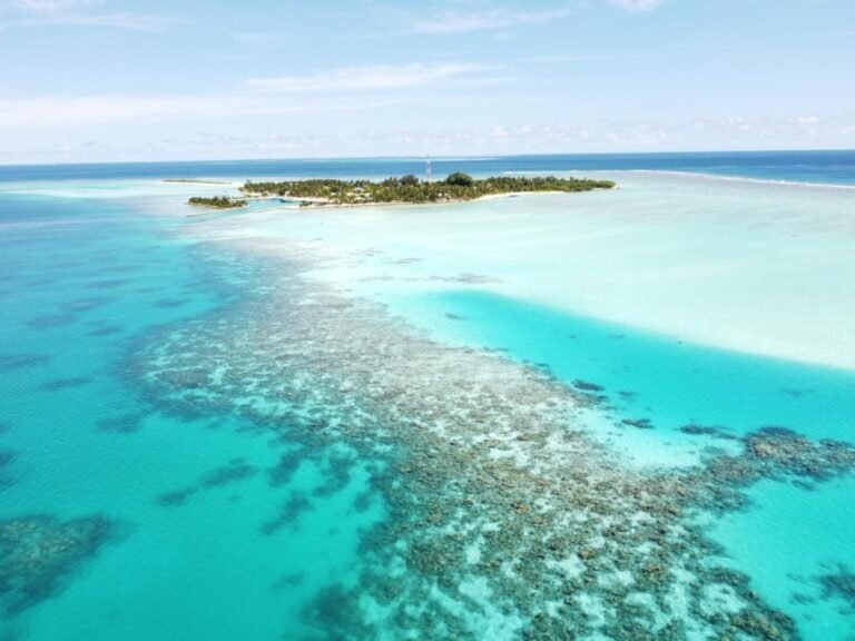 Mathiveri Beach near Mahchavaru Maldives with crystal-clear water and white sand.