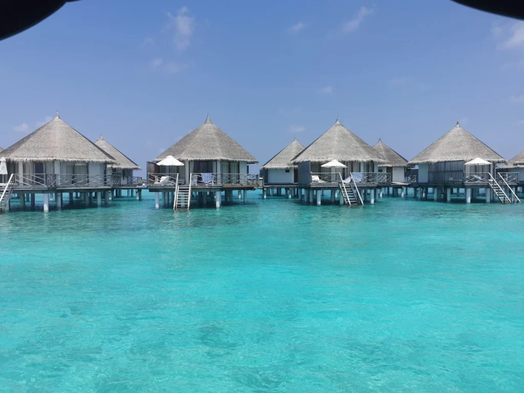 Aerial view of Angaga Island Resort & Spa in South Ari Atoll, Maldives, showing turquoise waters and sandy beaches
