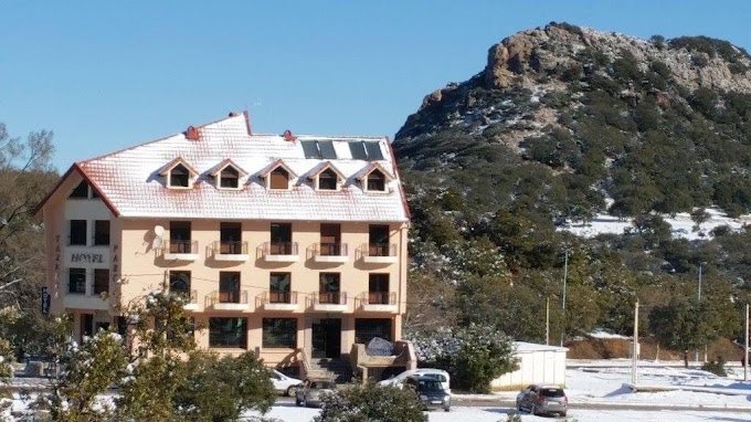 Tazekka Parc Hotel exterior surrounded by cedar trees in Taza, Morocco