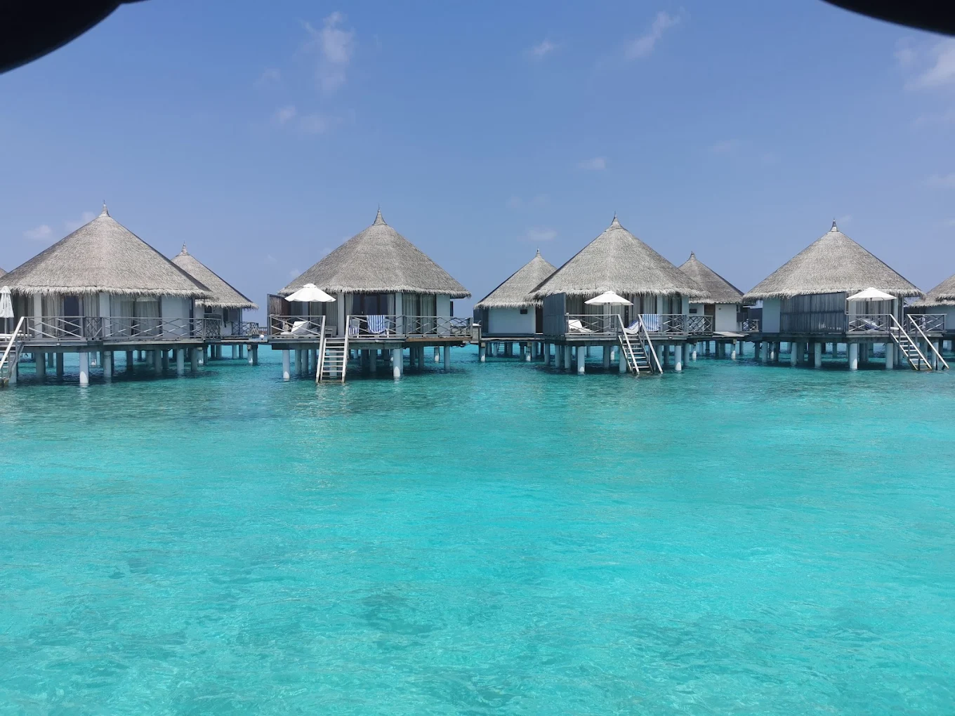 Aerial view of Angaga Island Resort & Spa in South Ari Atoll, Maldives, showing turquoise waters and sandy beaches