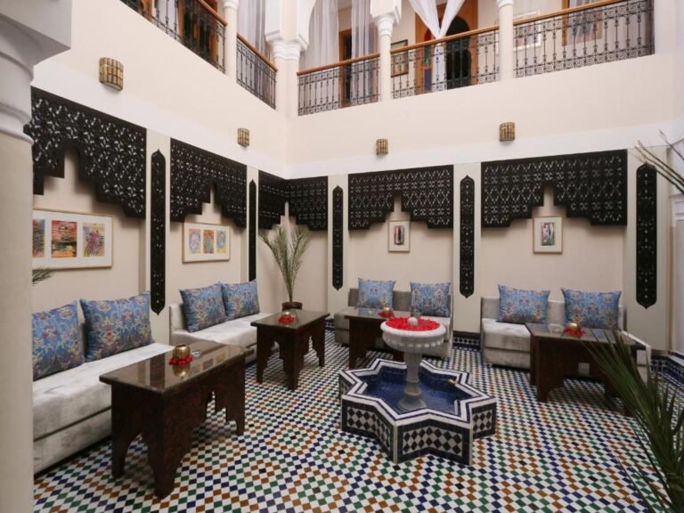 Courtyard of Riad Zaki Marrakech with fountain and mosaic tiles