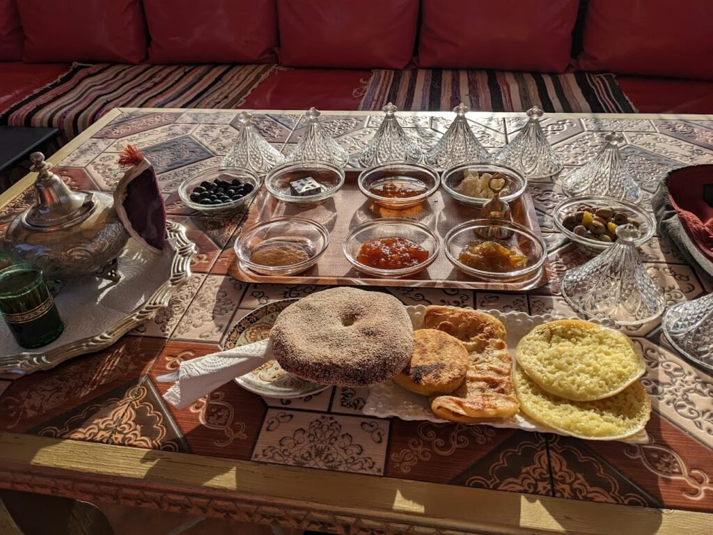 Dining area at Hôtel Riad Cafétéria LAHLOU serving Moroccan cuisine