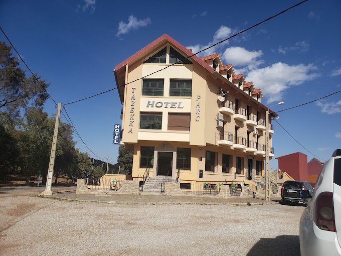 Tazekka Parc Hotel exterior surrounded by cedar trees in Taza, Morocco