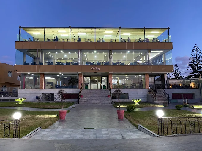 Amwaj Hotel El Jadida Morocco exterior view overlooking the Atlantic Ocean at sunset