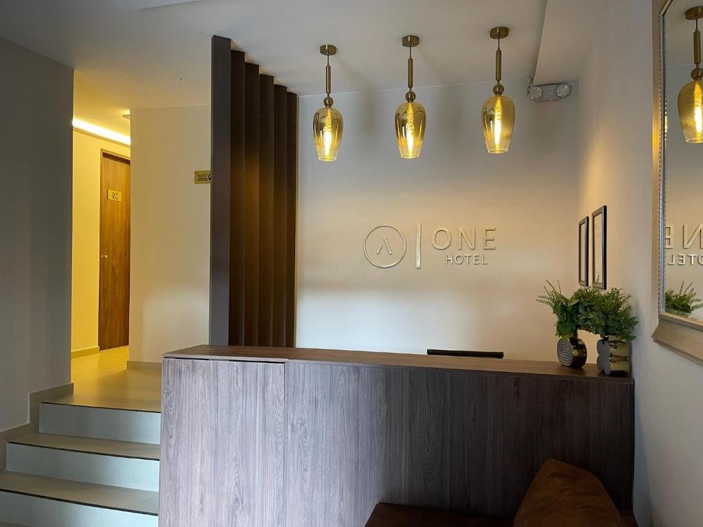 Front entrance of One Apartments Provenza Medellín in the Provenza neighborhood