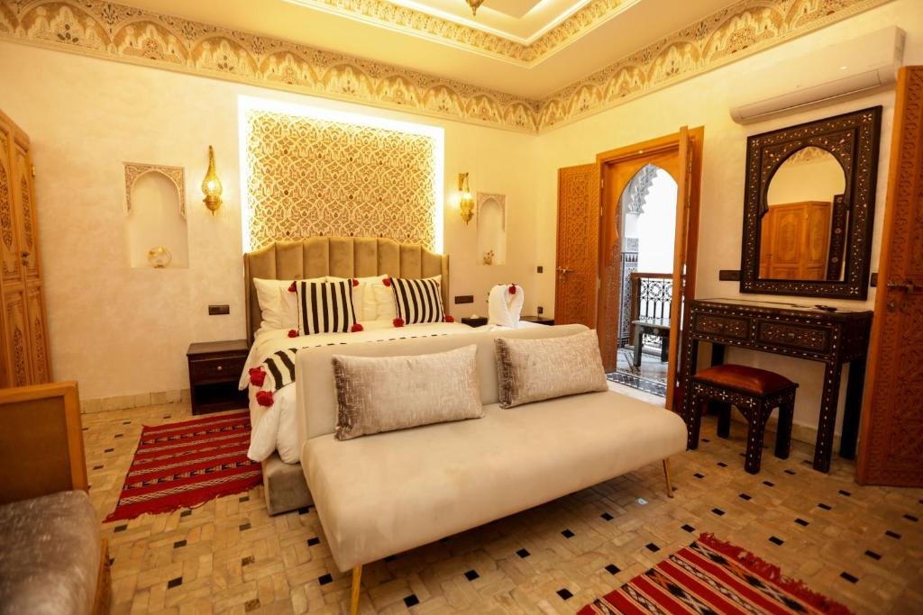 Comfortable riad bedroom with authentic decor at Riad Palais MERYEM, Morocco