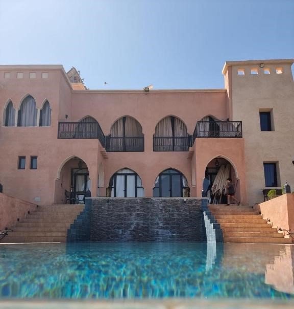Entrance of Riad Timskrine with traditional Moroccan décor”