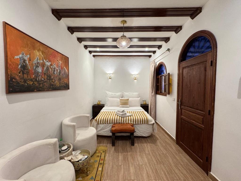 Traditional Moroccan-style bedroom at Riad Safia, Rabat