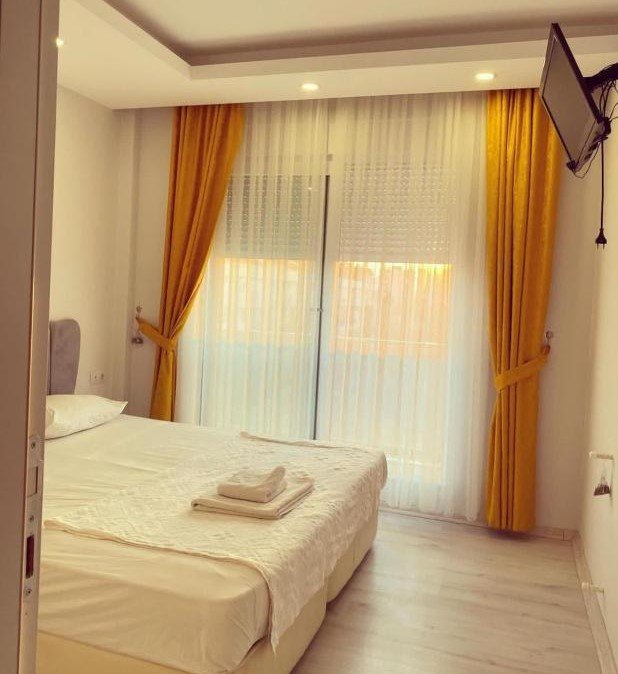 Spacious suite at Akdeniz Suites Hotel with balcony in Antalya, Türkiye