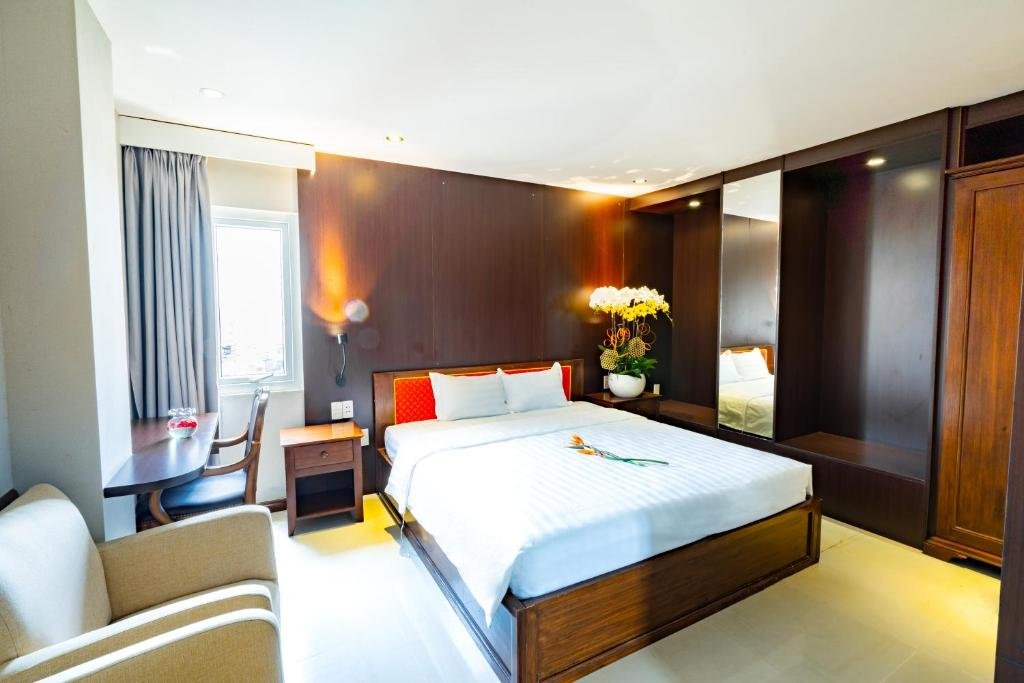 Comfortable guest room at Bonka Hotel in District 5, Ho Chi Minh City