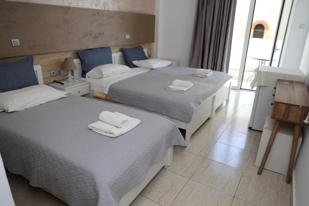 Bright and clean room at Marie Hotel, Kos Town, Greece with balcony view