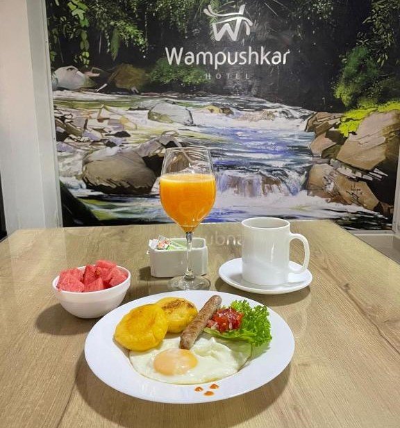 Breakfast served at Hotel Wampushkar in Zamora, Ecuador for hotel guests
