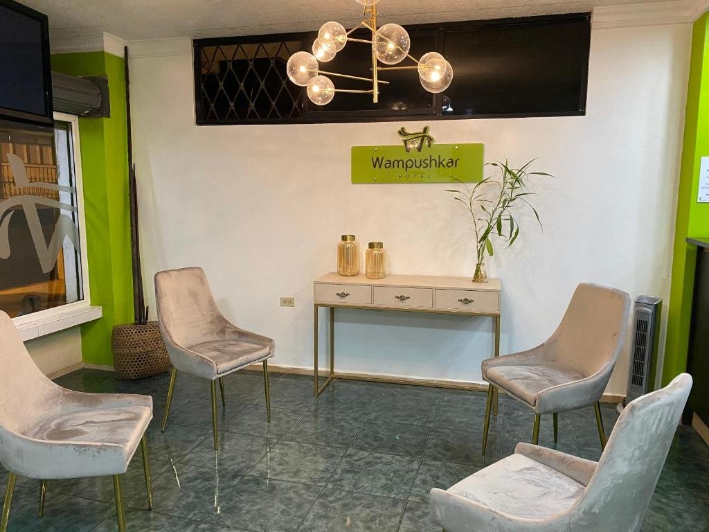 Clean and comfortable guest room at Hotel Wampushkar in Zamora, Ecuador