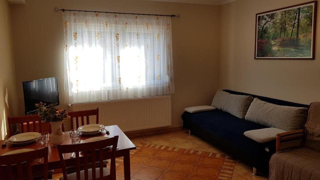 Clean and cozy living area at Laci Apartman apartment in Zalakaros, Hungary