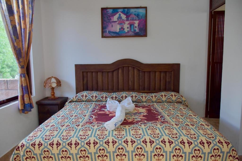 Comfortable guest room at Hotel Yara in Ixtapan de la Sal, Mexico