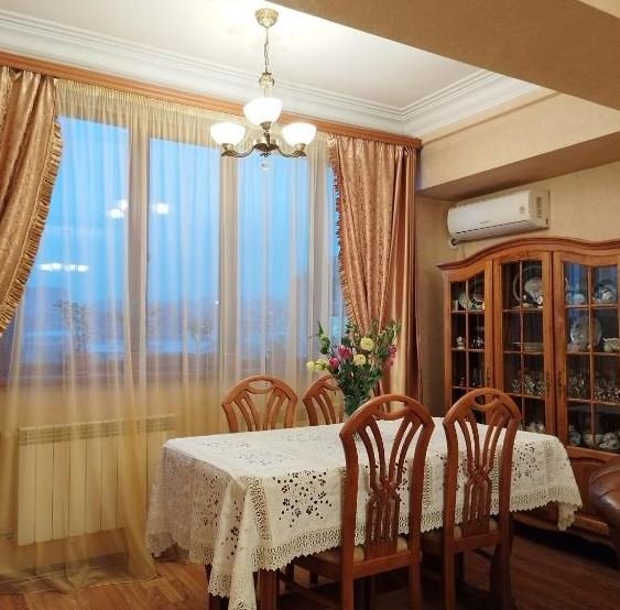 Bright and cozy living area inside LeSi Apartament in Yerevan, Armenia, with comfortable seating and natural light