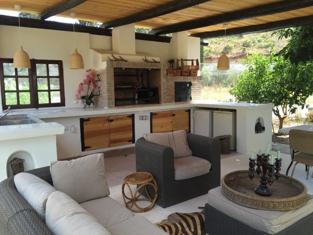 Garden and outdoor terrace at Finca Mil Estrellas boutique finca Spain