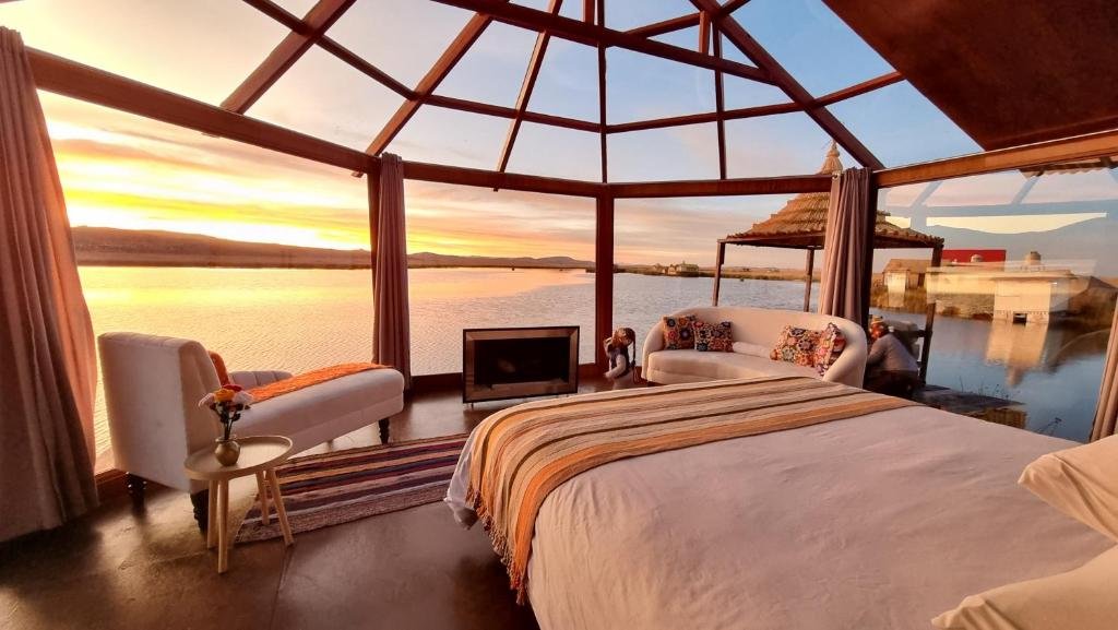 Luxury room with lake view at UROS KAY PACHA Lodge on the Uros floating islands Peru
