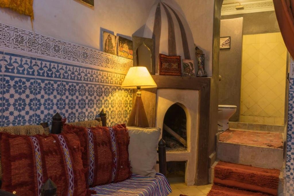 Riad Sidi Omar peaceful courtyard with Moroccan tiles and plants