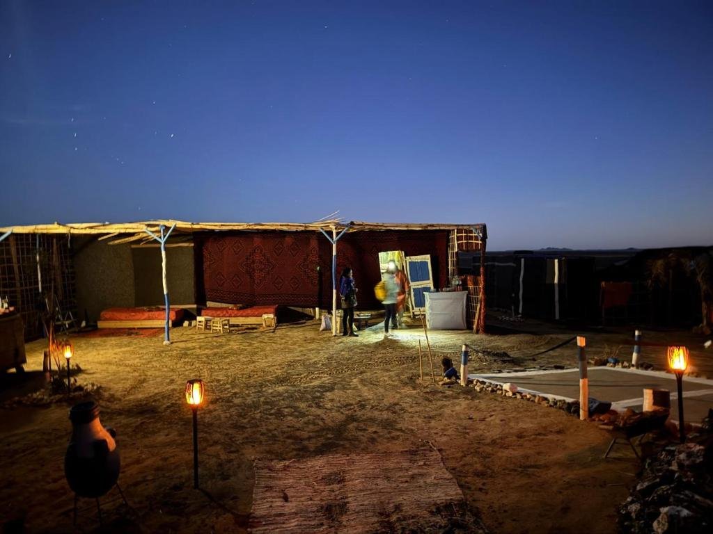 Desert camp tent under the stars at Obira Oasis Merzouga Camp Morocco