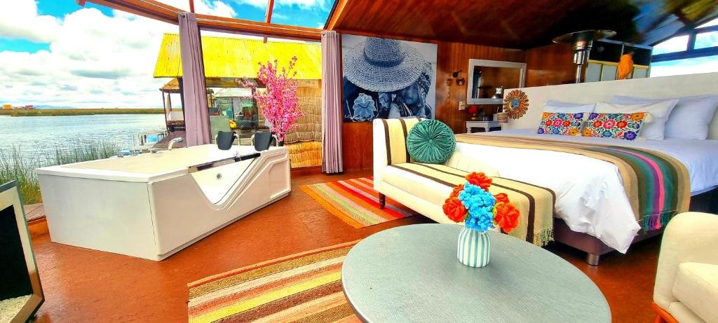 Luxury room with lake view at UROS KAY PACHA Lodge on the Uros floating islands Peru