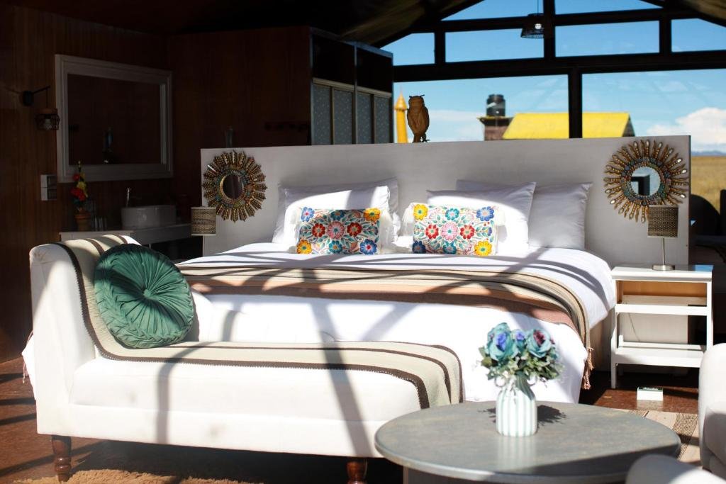Luxury room with lake view at UROS KAY PACHA Lodge on the Uros floating islands Peru
